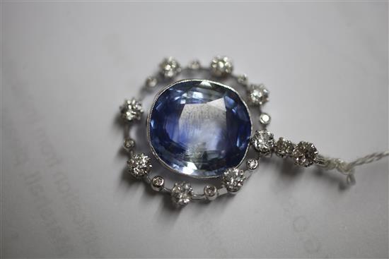 A white gold, sapphire and diamond drop pendant, 38mm inc. bale.